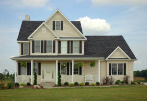 A farmhouse style home with newly installed energy-efficient windows 